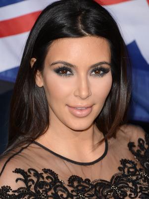 Kim Kardashian y Kanye West esperan una niña, según fuente